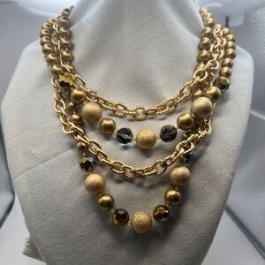 4 Strand gold, matte gold and chain link beaded necklace